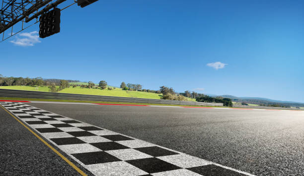 istock Wide angle view empty asphalt international race track 1147790352