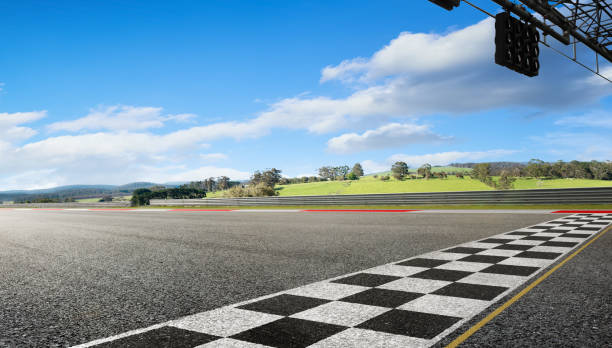 istock Wide angle view empty asphalt international race track 1147790408