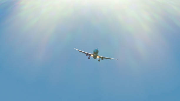 istock Passenger airplane. Airplane is flying in blue sky. Passenger aircraft. 1147790440