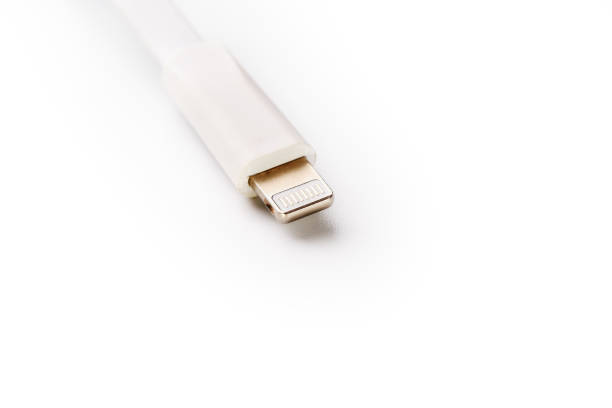 istock Connector lightning on a white background. This is a proprietary connector used to connect mobile devices to well-known host computers 1147795786