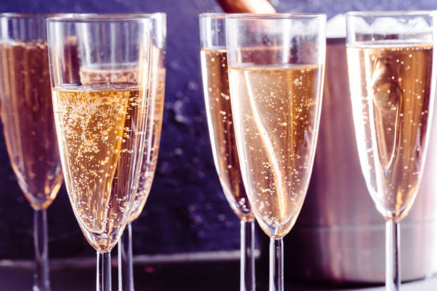 istock Glasses of champagne on the table 1147795944