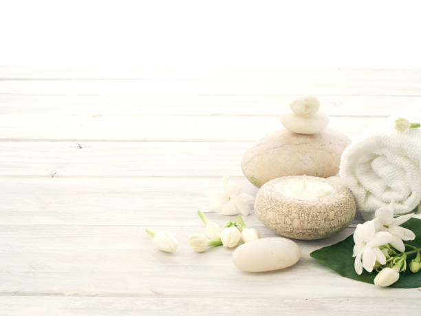 istock Spa concept with jasmine flowers on a white wooden background 1147796651