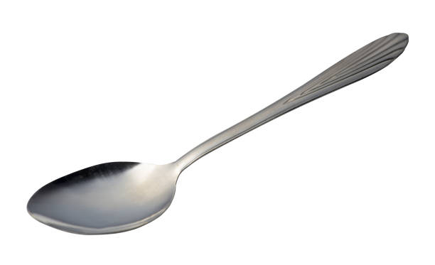 istock spoon isolated on white background. metal spoon. vintage spoon. 1147797423