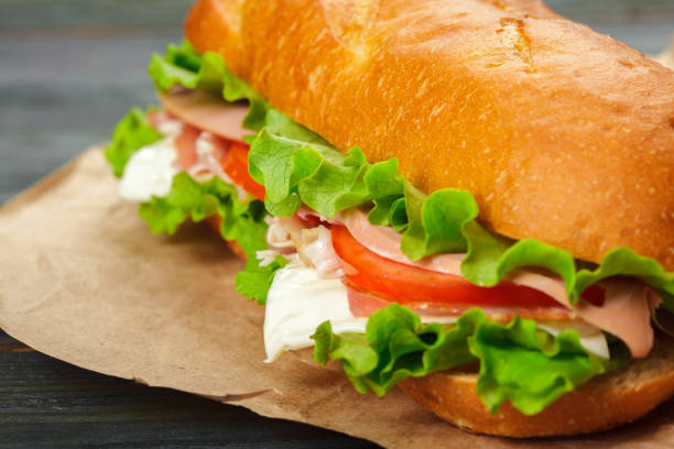 istock sandwich on a wooden table 1147801347