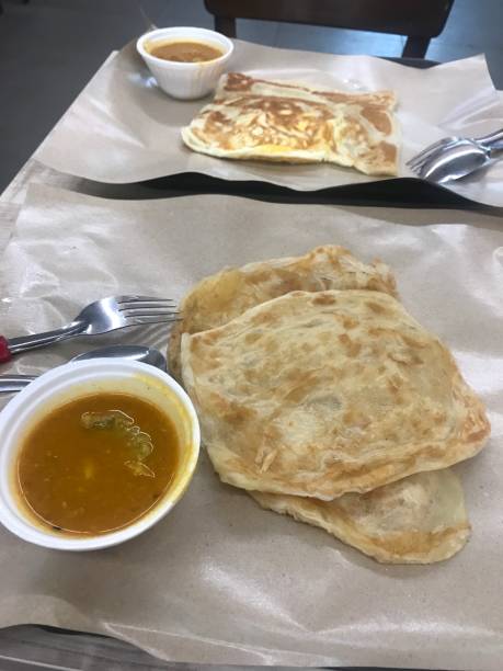 istock Two servings of roti and daal 1147804834