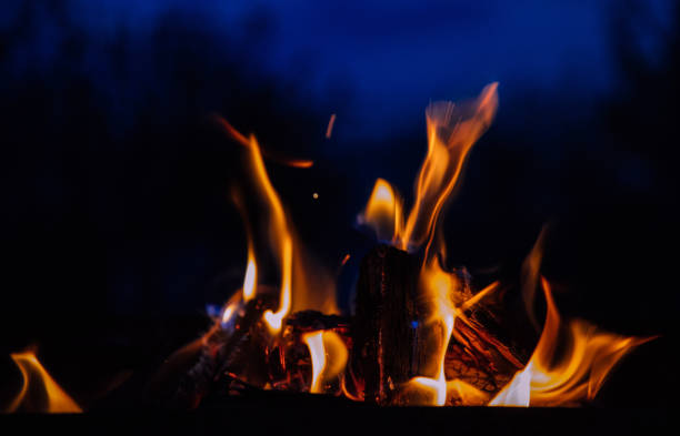 istock Fire flames and hot charcoal at night 1147806458
