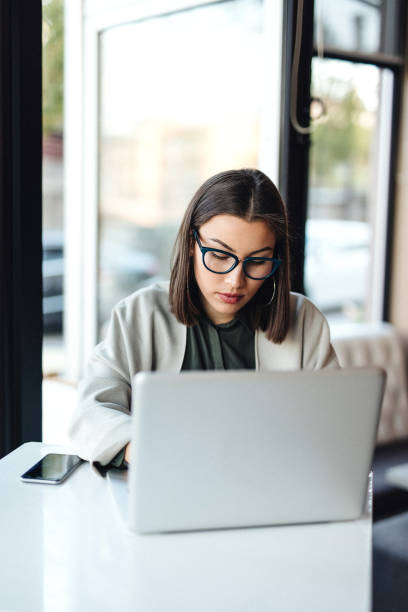istock Woman Working on Her Laptop 1147807789