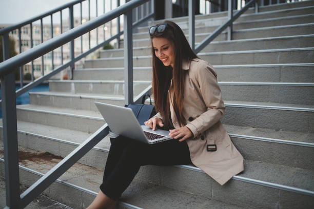 istock Photo of a woman using laptop 1147807876