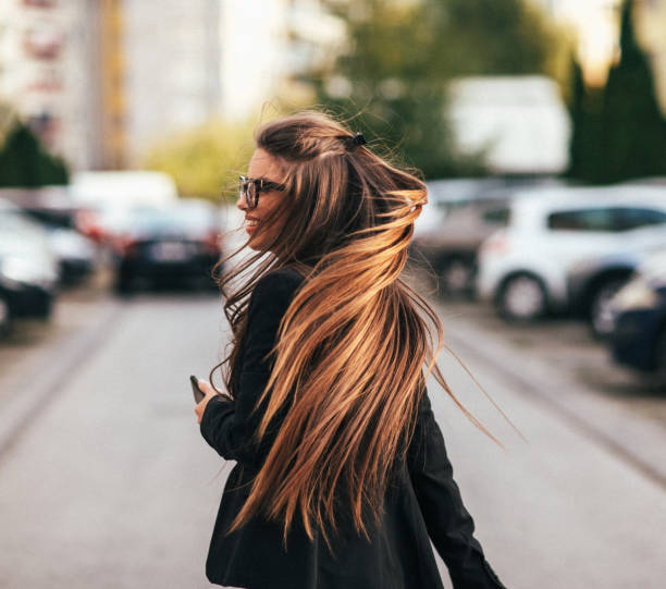 Felling freedom. Long hair. Rear view