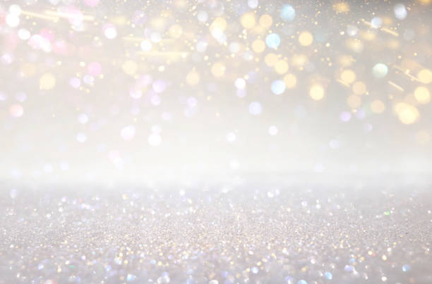 istock glitter silver and gild lights background. de-focused 1147809051