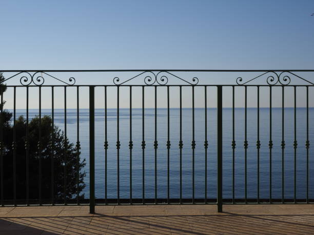 istock railing in front of sea 1147809674
