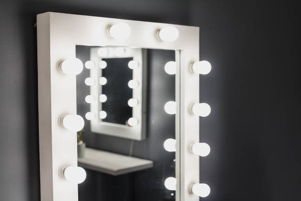 istock Empty interior of a beauty salon with a mirror and lamp 1147811924