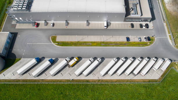 istock Loading bay, industrial building, logistics - aerial view 1147812915