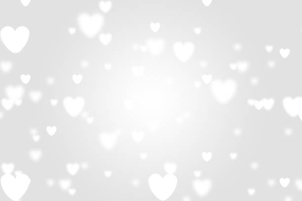 istock Heart icon bokeh on grey color background. 1147813034