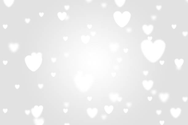 istock Heart icon bokeh on grey color background. 1147813053