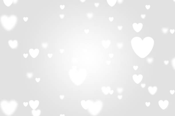 istock Heart icon bokeh on grey color background. 1147813083