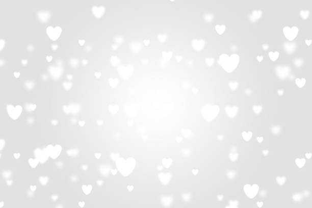 istock Heart icon bokeh on grey color background. 1147813278