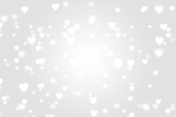 istock Heart icon bokeh on grey color background. 1147813857