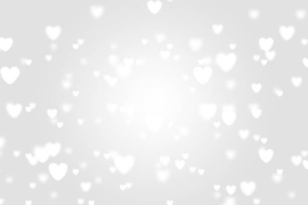 istock Heart icon bokeh on grey color background. 1147813863