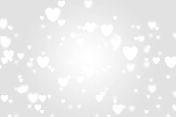 istock Heart icon bokeh on grey color background. 1147813868