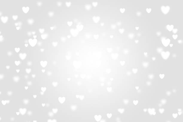 istock Heart icon bokeh on grey color background. 1147813876