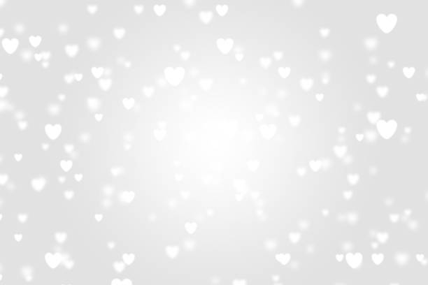 istock Heart icon bokeh on grey color background. 1147814529