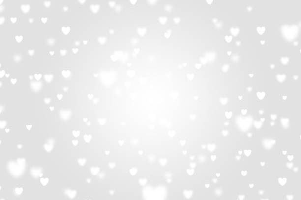 istock Heart icon bokeh on grey color background. 1147814561