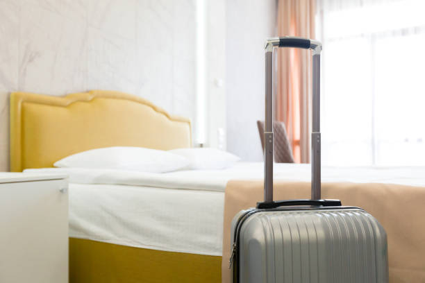 istock Suitcase or luggage bag in a modern hotel room 1147814630
