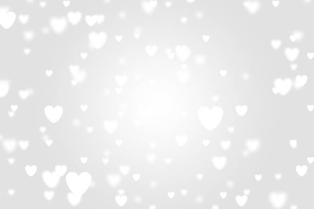 istock Heart icon bokeh on grey color background. 1147814712