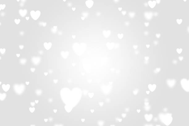 istock Heart icon bokeh on grey color background. 1147814787