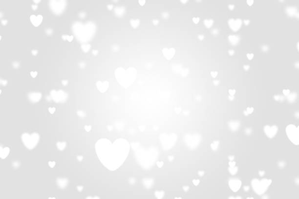 istock Heart icon bokeh on grey color background. 1147814838