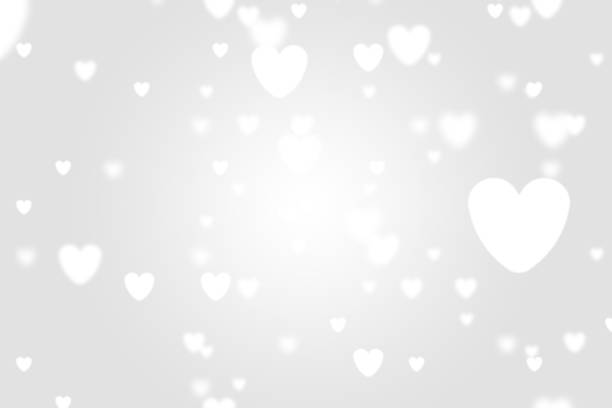 istock Heart icon bokeh on grey color background. 1147814978
