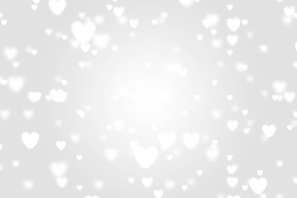 istock Heart icon bokeh on grey color background. 1147814985