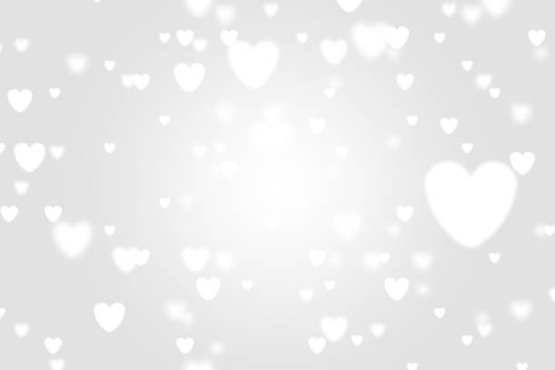 istock Heart icon bokeh on grey color background. 1147815028