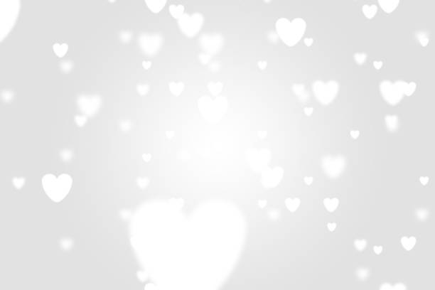 istock Heart icon bokeh on grey color background. 1147815440