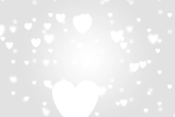 istock Heart icon bokeh on grey color background. 1147815559