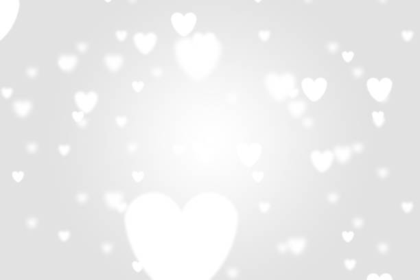 istock Heart icon bokeh on grey color background. 1147815564