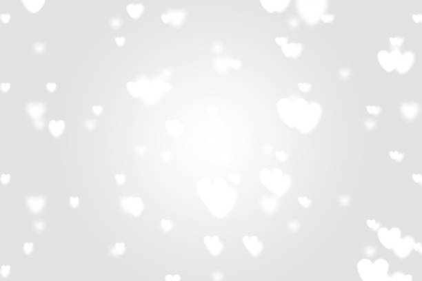 istock Heart icon bokeh on grey color background. 1147815632