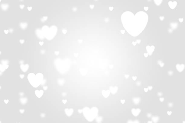 istock Heart icon bokeh on grey color background. 1147815640