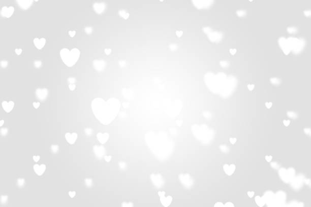 istock Heart icon bokeh on grey color background. 1147815695