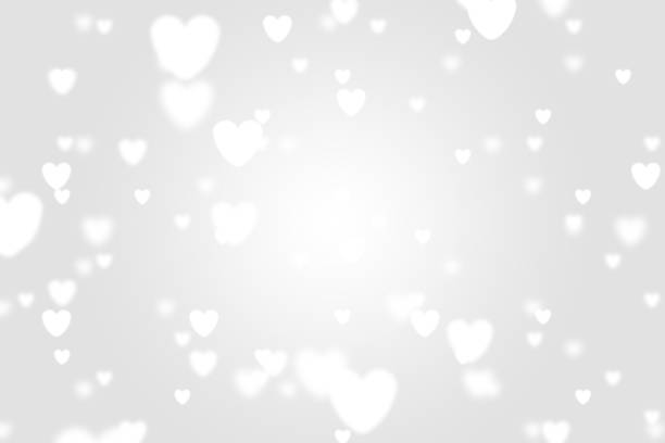 istock Heart icon bokeh on grey color background. 1147816296