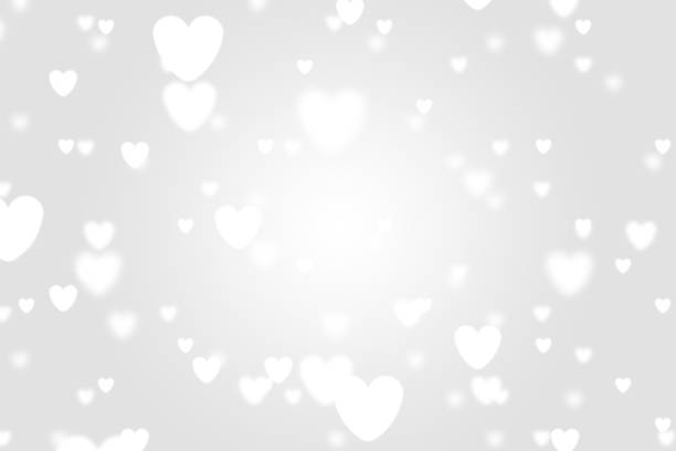 istock Heart icon bokeh on grey color background. 1147816319