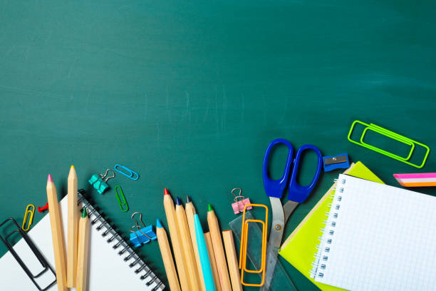 istock School and office supplies on blackboard 1147816348