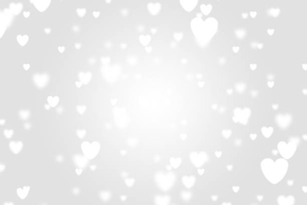 istock Heart icon bokeh on grey color background. 1147816494