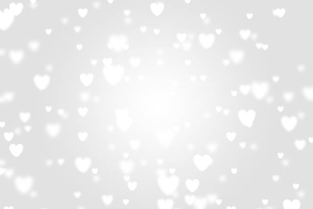 istock Heart icon bokeh on grey color background. 1147816558