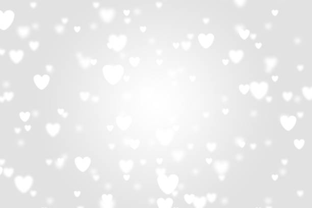 istock Heart icon bokeh on grey color background. 1147816562