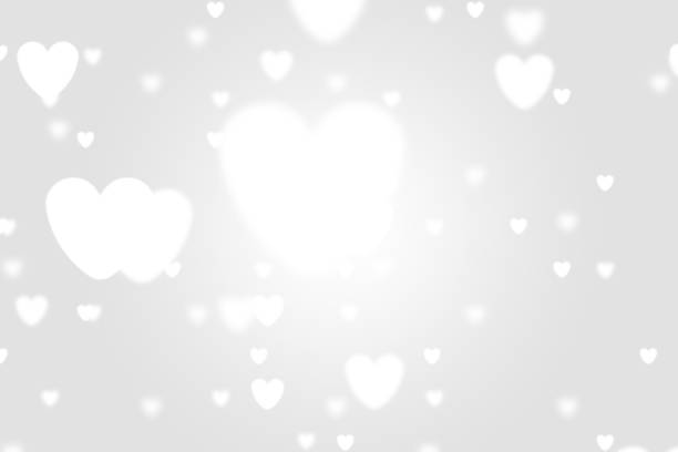istock Heart icon bokeh on grey color background. 1147816640