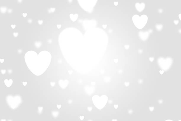 istock Heart icon bokeh on grey color background. 1147816751
