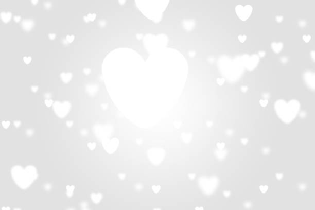 istock Heart icon bokeh on grey color background. 1147816756