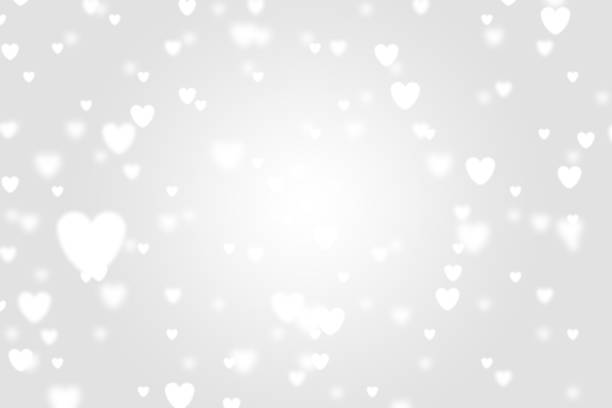 istock Heart icon bokeh on grey color background. 1147816761